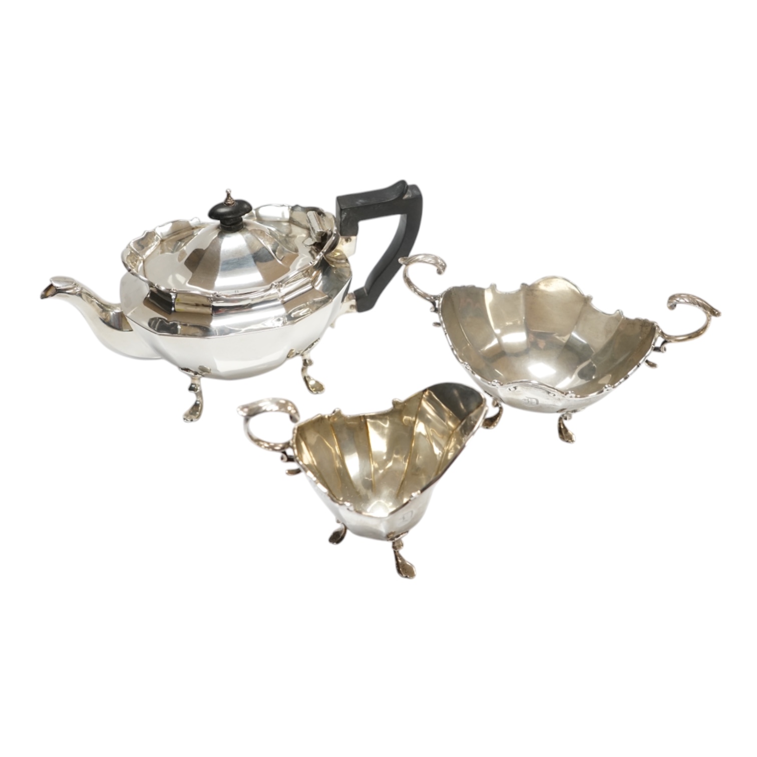 A late Victorian silver three piece bachelor’s tea set, David & George Edward, London, 1899, gross weight 18.8oz. Condition - fair to good